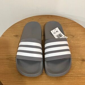 Gray Adidas slip ons